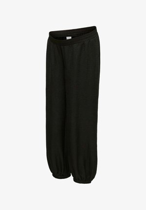 - Spodnie materiałowe