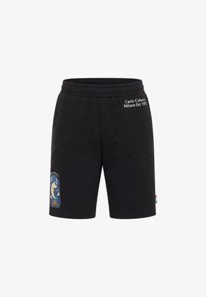 Sorte bomulds shorts med elastisk talje, prydet med et broderet mærke med en måne og stjerner samt hvid tekst på siden.