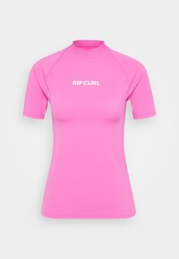 Short-sleeve rash guard in bright pink material with a mock neck. Features white "RIP CURL" logo on the front. Smooth, stretchy texture.