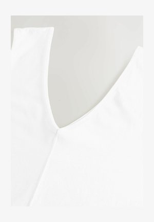 Biała bezrękawnik z głębokim dekoltem w serek i gładką, miękką fakturą, z przeszyciem wzdłuż dekoltu.