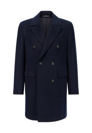 Marineblauer Woll-Doppelreiher mit einem Reverskragen, zwei Vordertaschen und sechs schwarzen Knöpfen zum Schließen.