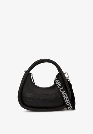 Black faux leather handbag with a curved shape, featuring a logo print, detachable strap, smooth texture, and a metal zip closure.