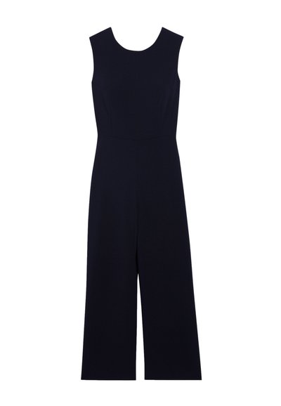 Combinaison bleu marine sans manches, avec un col rond et des jambes larges et courtes, fabriquée à partir d'un tissu lisse sans motifs ni accents.