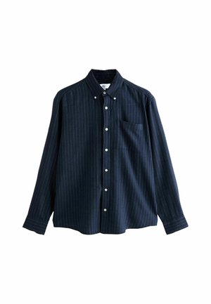 Marinskjorta med vita vertikala stripe; långa ärmar, en bröstficka och kontrasterande vita knappar. Mjuk tygtextur.