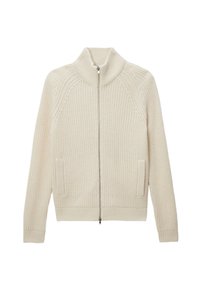 Pull en tricot crème avec fermeture éclair, col montant, texture côtelée, manches raglan et poches latérales. Il est doté d'une fermeture éclair en argent et de poignets ajustés.