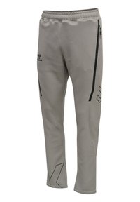 Grå sweats med blødt stof og afslappet pasform, med en taljeelastik, en lynlås lomme samt sorte detaljer og logoer.