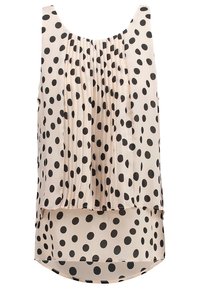 Blusa senza maniche rosa chiaro con grandi pois neri, fronte plissettata e un orlo posteriore più lungo. Tessuto morbido e leggero.