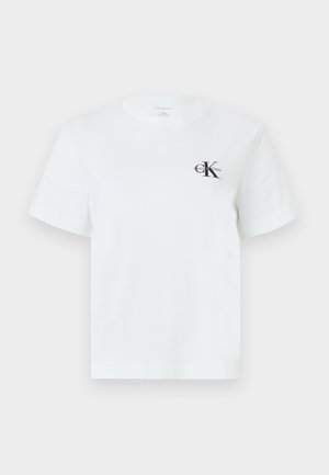 Tricou alb cu mâneci scurte, prevăzut cu un mic logo negru Calvin Klein "cK" pe partea stângă a pieptului, cu guler rotund, design simplu și minimalist.