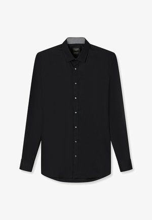 Schwarzes Langarmhemd mit klassischem Kragen, durchgehender Knopfleiste und geknöpften Ärmeln; glatte Textur mit kontrastierendem Innenkragen-Detail.