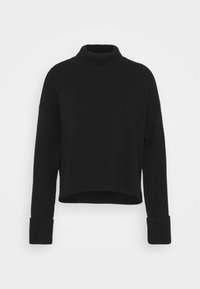 Maglione nero a collo alto in maglia con maniche lunghe e polsini a coste larghi, caratterizzato da un orlo leggermente accorciato e a coste.