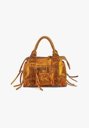 Sac à main en cuir couleur cuivre métallisé avec doubles poignées, poche avant zippée, détails de boucle et plusieurs pompons décoratifs en cuir.