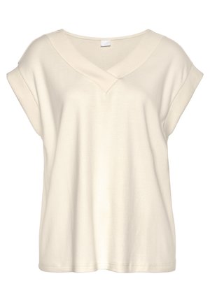 Blouse à manches courtes couleur crème avec col en V large et manches retroussées, confectionnée dans un tissu doux et léger.