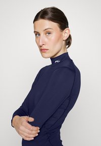 Kjus WOMEN BASE LAYER TURTLENECK - Top dugih rukava - atlanta blue
