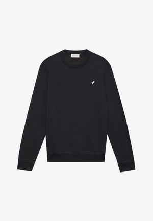 Mustast pika varrukatega crewneck-sviiteril on vasakul rinnal väike valge lindloog, ribatooted ja äär.