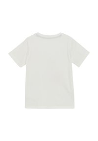 T-shirt en coton blanc à manches courtes. Design simple à col rond, texture lisse et sans motifs ni accents visibles au dos.