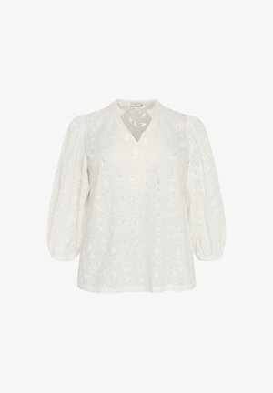 Valge pluus, millel on V-kaelus, balloonvarrukad ja keeruline lilleline tikand koos lõike detailidega üle kogu kangast.