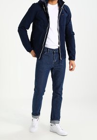 Tommy Jeans Tunn jacka - dark blue