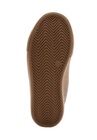 Suola di scarpa con una superficie in gomma marrone testurizzata, caratterizzata da un motivo a zigzag e un accento circolare, progettata per la trazione e la durata.