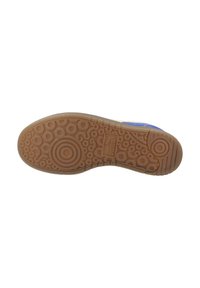 Talpa de pantof cu un design texturat din cauciuc, având modele circulare și un logo proeminent. Culoarea este bej deschis, cu un finisaj transparent.