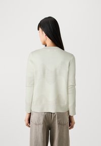 Marimekko KOOLAUS LOKKI - Pulover - off-white/light grey
