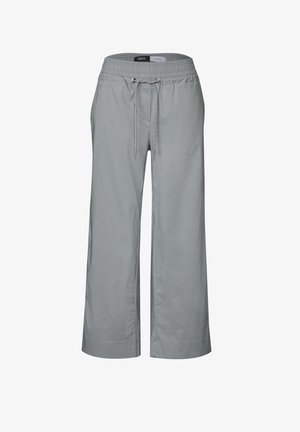 Vaaleanharmaat, leveät housut, joissa on joustava vyötärö, nyöri suljenta ja sileä, hengittävä kangas, joka on yksinkertainen muotoilu.