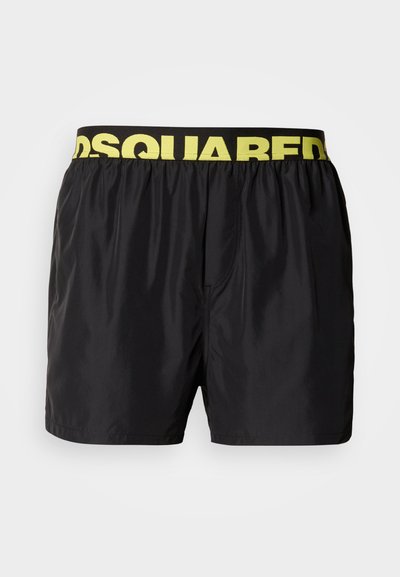 Pantaloni scurți de înot negri, realizați dintr-un material ușor, cu talie elastică galbenă cu logo-ul "DSQUARED2" și un design clasic cu detalii cusute.