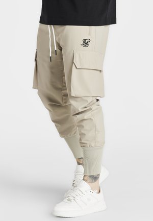 TECH - Cargo trousers - beige