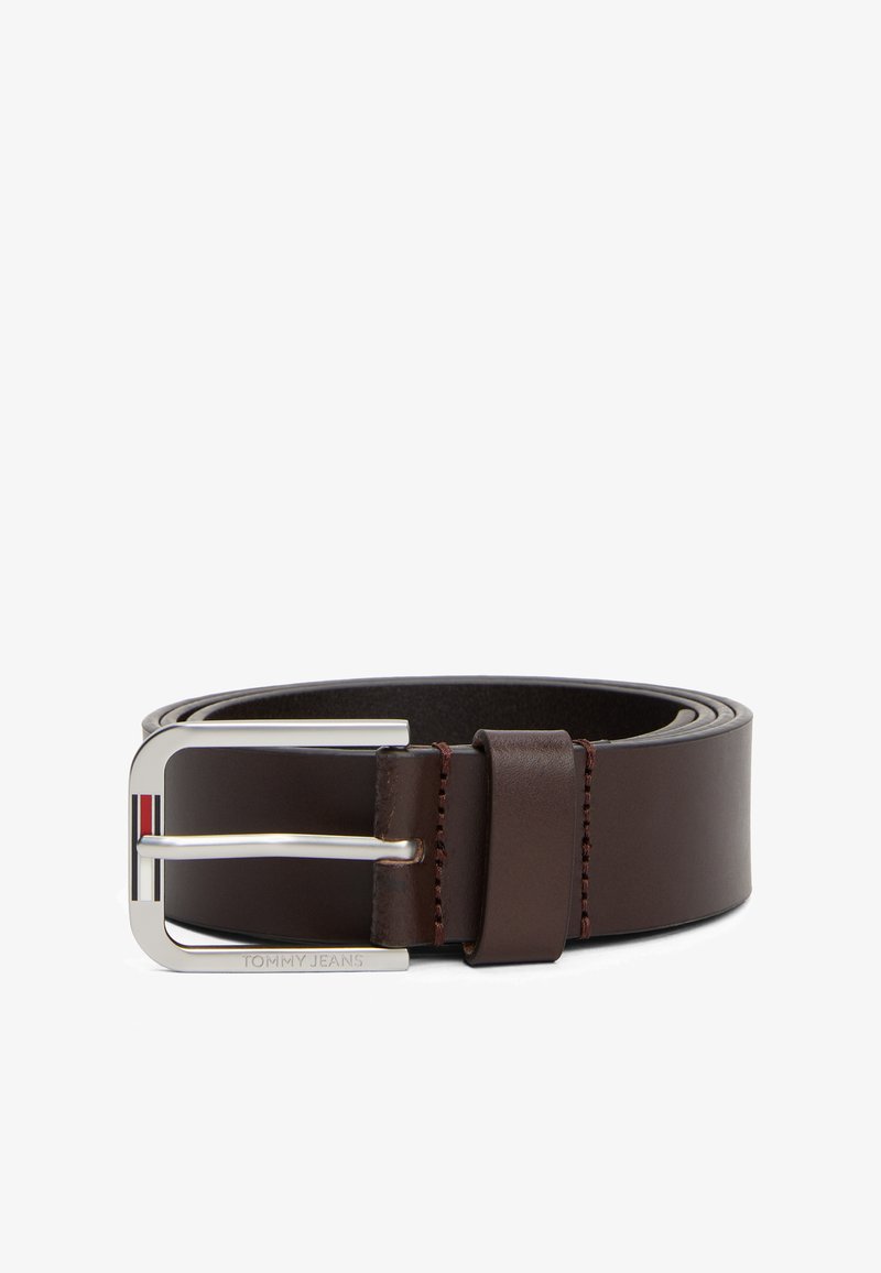 Brown leather belt with a silver rectangular buckle, featuring a red and blue striped accent and branded "TOMMY JEANS." Smooth texture.