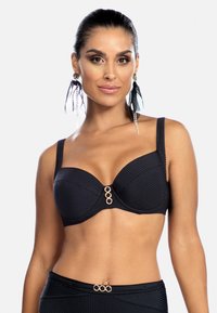 Czarny prążkowany top bikini z fiszbinami i regulowanymi ramiączkami. Posiada złote okrągłe akcenty na środku. Gładka faktura z usztywnionymi miseczkami.