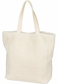 Torebka typu tote w kolorze kremowym, wykonana z teksturowanego sztucznego owczej wełny, z dwoma długimi, gładkimi skórzanymi uchwytami. Prosty prostokątny kształt, miękka i niestrukturalna.