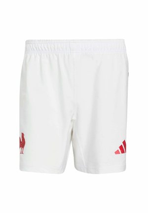 Valkoiset shortsit, joissa on joustava vyötärönauha, punainen kukkoembleemi ja punaiset Adidas-raidoitukset sivuilla. Sileä kangaspinta.