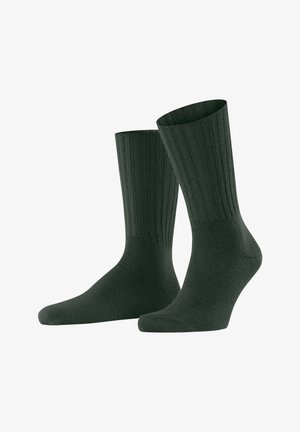 Dark green ribbed socks with a textured finish and reinforced heel and toe. Standard length, suitable for casual wear.
