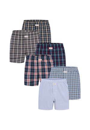 Six pairs of men's plaid and striped boxer shorts in various blue, brown, and red tones arranged in two rows on a white background.