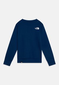 Sweatshirt azul marinho de mangas longas, com gola redonda, punhos e bainha canelados. Apresenta um logótipo branco nas costas. Feito de um tecido suave e texturizado.