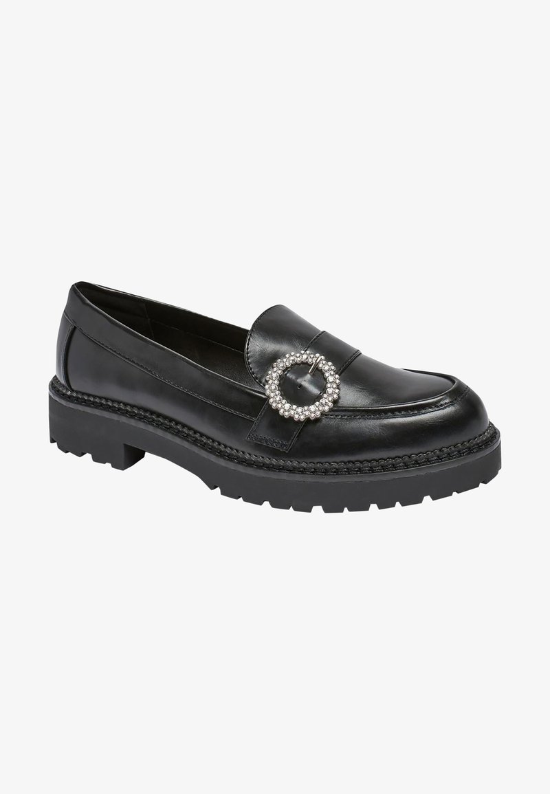 Schwarze Lederloafers mit rundem Zehenbereich, verziert mit einem dekorativen, kreisförmigen Edelsteinakzent und einer dicken, strukturierten schwarzen Sohle.