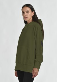 Deha RHYTHM MOVE HYPE - Felpa con cappuccio - verde oliva