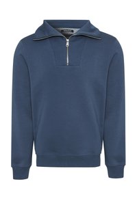 Granatowy sweatshirt z wysokim kołnierzem i pół-zamkiem, charakteryzujący się jednolitą teksturą oraz ściągaczami przy mankietach i dolnej krawędzi. Klasyczny krój.