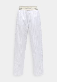 Bele pidžame z navpičnimi mornarsko modrimi črtami, elastikami na pasu z oznako "Calvin Klein", ravno krojeni nogi in mehko bombažno tkanino.