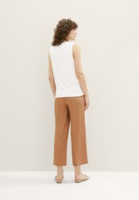 T-shirt e top da donna Tom Tailor | Zalando Svizzera