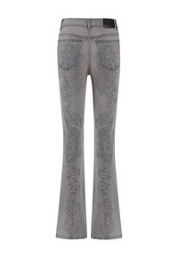 Jeans grigi a zampa con intricate fantasie floreali nere e design astratti lungo i lati. Presentano una patta in pelle nera sulla vita posteriore.