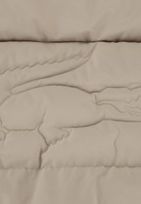 Lacoste CORE PUFFER JKT UNISEX - Giacca invernale - beige