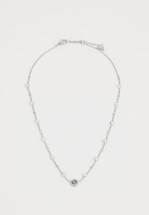 Silver chain necklace with small pearls and clear crystals spaced evenly, featuring a round central charm with a decorative design.