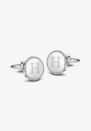 Okrągłe srebrne spinki do mankietów z monogramem "H" w teksturowanej ramce z małymi, osadzonymi kamieniami. Polerowane wykończenie z eleganckim designem.