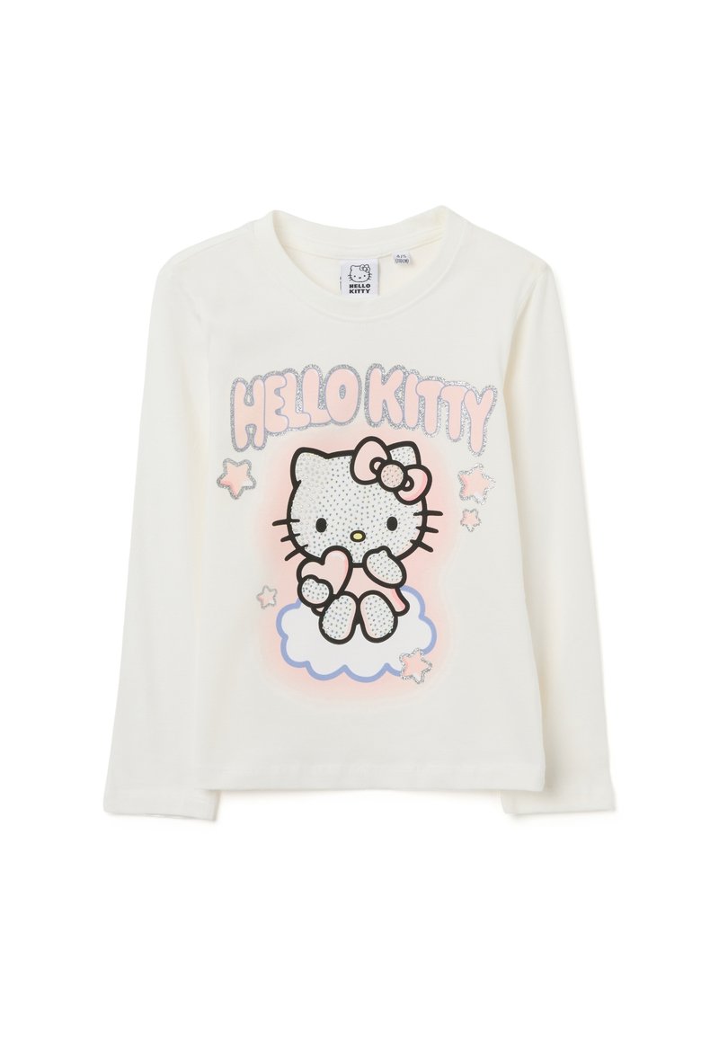 Creme kleuren blouse met lange mouwen, voorzien van een glinsterende, gestipte Hello Kitty afbeelding, roze accenten en sterontwerpen op een lichtblauwe wolkenachtergrond.