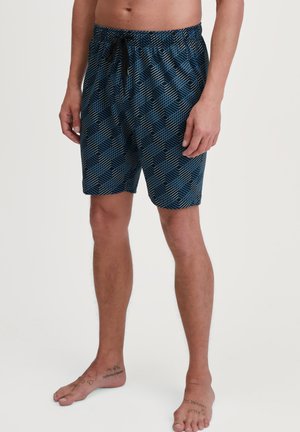 Shorts de bain bleu marine avec un motif géométrique. Fabriqués en matériau léger, ayant une taille élastique et un cordon de serrage ajustable.