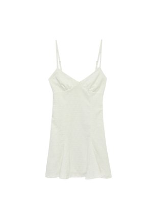 Witte mouwloze jurk met dunne verstelbare bandjes, V-hals en ooglet kantstof detail.