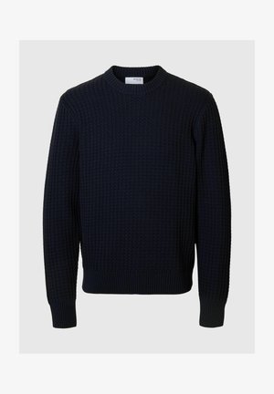 Mornarsko modra pletena pulover s teksturo, dolge rokave in krojnim ovratnikom; rebrasti manšeti in rob dodata strukturo. Lahkoten material.