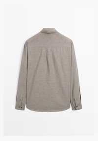Gray long-sleeve shirt made of textured fabric, featuring a button-down collar, two cuff buttons, and a center back pleat.