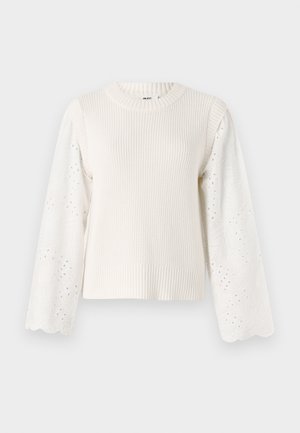 Sweter w kolorze kremowym z prążkowanym korpusem i gładkimi, haftowanymi rękawami z kwiatowymi wycięciami oraz falbannikami.