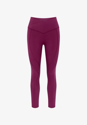 Legginsit syvän burgundin värissä, joissa on korkea vyötärö ristiin menevällä muotoilulla, sileä pinta ja kaarevat saumat jaloissa.